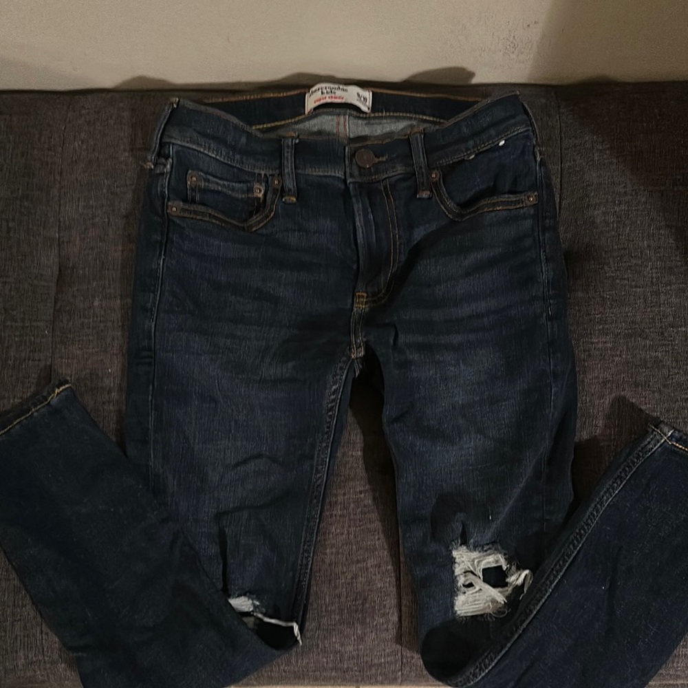 Distressed Dark Blue Jeans